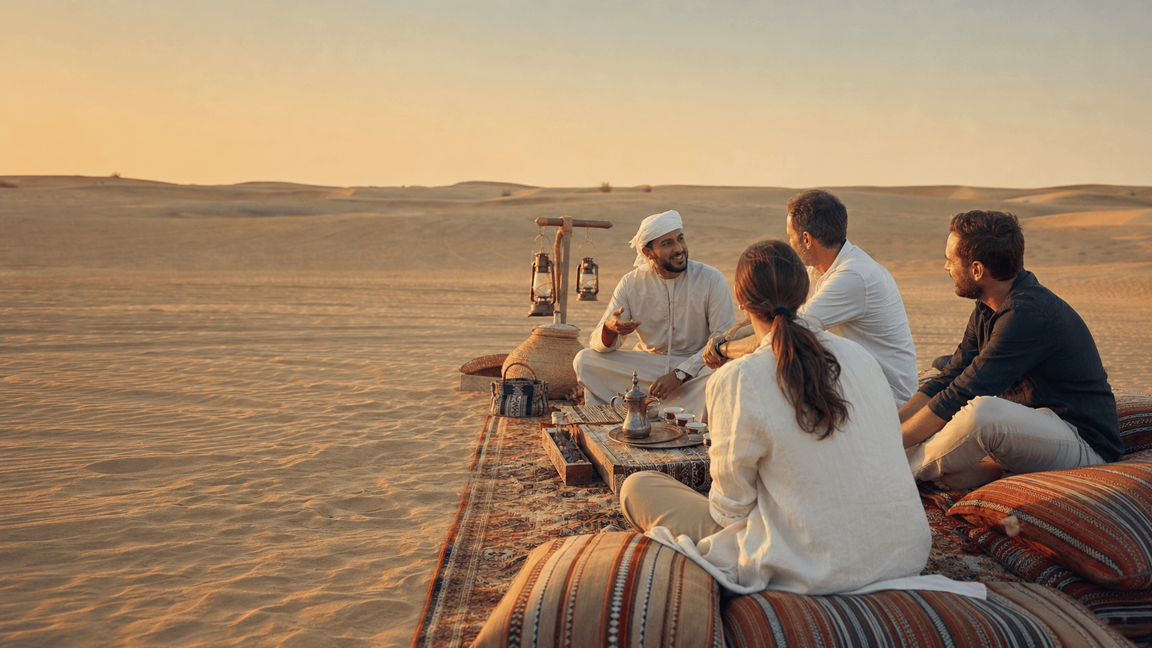 A Desert Thrill host welcoming guests during a private Dubai desert experience